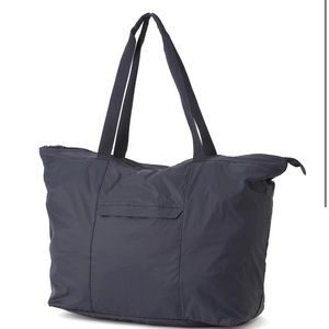 Muji foldable parachute material duffel bag. Light weight